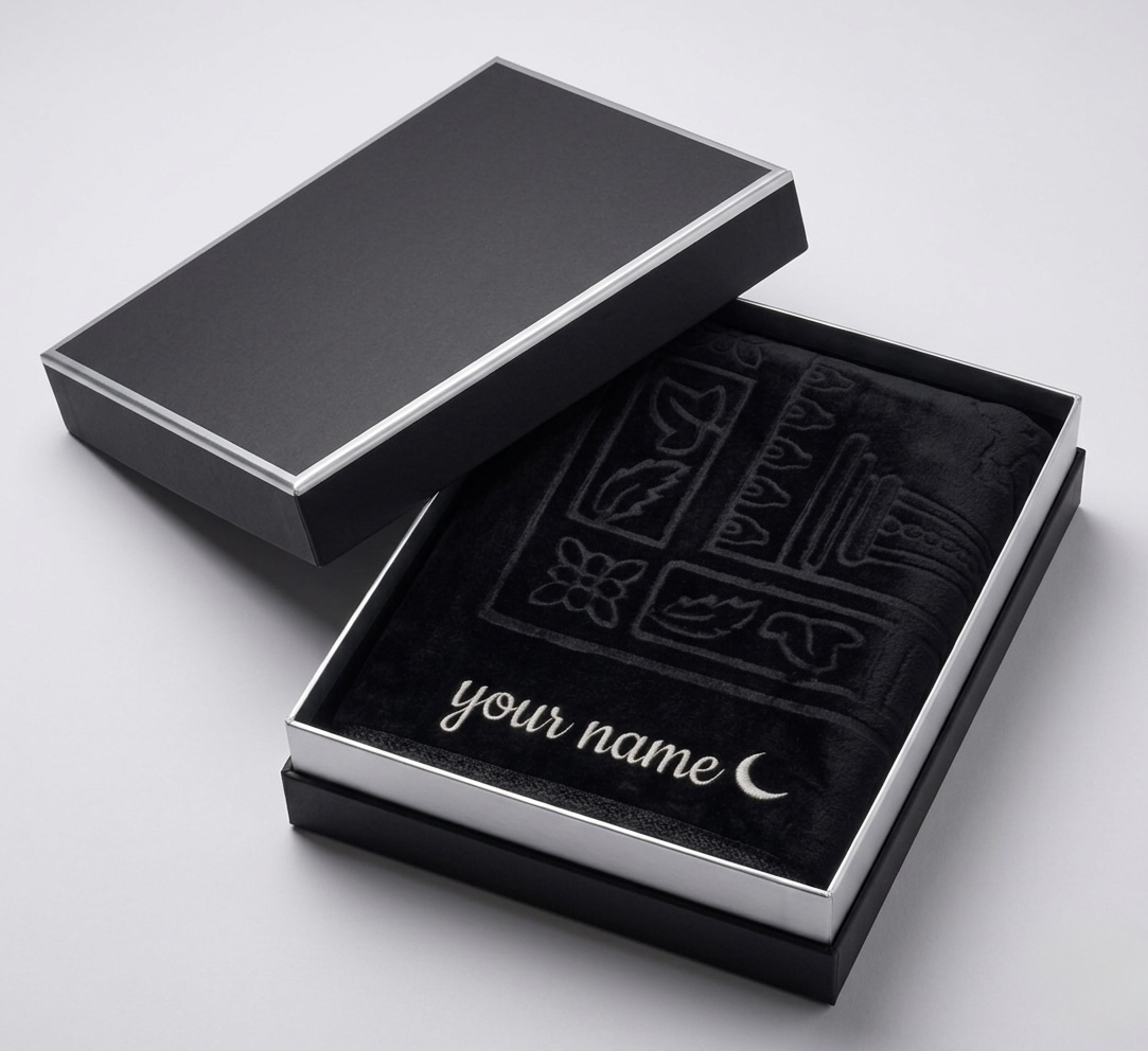 Black prayer mat in box