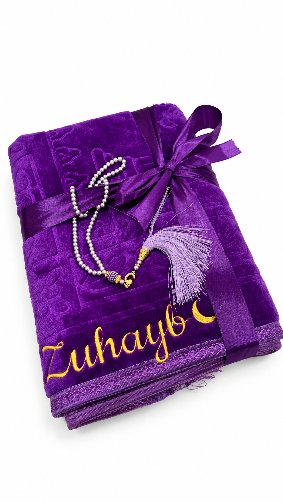 Folded prayer mat tied with a ribbon